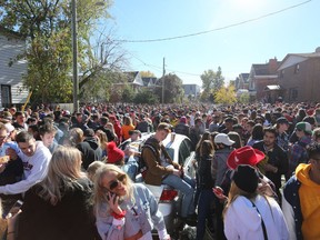 Kingston Police estimated approximately 10,000 students and their friends filled streets in the University District in Kingston during street parties on Oct. 20, 2018, celebrating Queen's University's Homecoming weekend. (Meghan Balogh/The Whig-Standard)