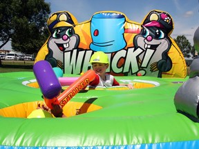 Devin Vlad, 11, enjoyed a giant game of inflatable whack-a-mole at the Pembroke Waterfront as part of the Canada Day festivities on July 1.