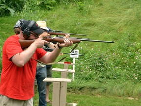 Shooters take aim and fire at the Milverton and District Rod and Gun Club in this photo from July 2019. (Galen Simmons/Beacon Herald file photo)