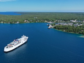 The Chi-Cheemaun heads for its dock in Tobemory last summer, in this photo taken with a drone. (Photo by Brian Ste. Marie)