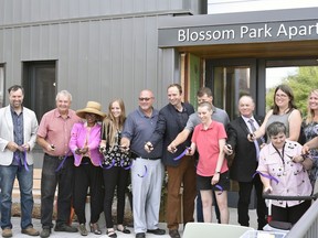 InDwell staff, donors, elected officials and residents gathered at Blossom Park Apartments, InDWell's newest project, for a ribbon cutting on Tuesday evening. The building welcomes 34 residents into an independent living space, with on-site housing, health, addition and skill supports.