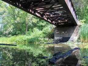 A view from underneath the Peanut Line trail bridge showing the metal structure on Thursday August 8, 2019 in Bridge End, Ont. Alan S. Hale/Cornwall Standard-Freeholder/Postmedia Network