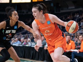 Connecticut Sun's Bridget Carleton, right, of Chatham, Ont., plays against the New York Liberty during a WNBA pre-season game at Times Union Center in Albany, N.Y., on May 19, 2019. (Chris Poss/Connecticut Sun)