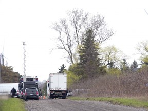 A body was discovered inside a refrigerator on a lakeside bluff (to the right of the photo) in Port Burwell in London, Ont. on Tuesday May 7, 2019. It happened near Lakeshore Line and Clark Road. Derek Ruttan/The London Free Press/Postmedia Network