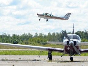A plane takes off during the Canadian Owners and Pilots Association Flight 68's COPA for Kids event at the Wiarton Keppel International Airport on Saturday, August 24, 2019 near Wiarton, Ont.
