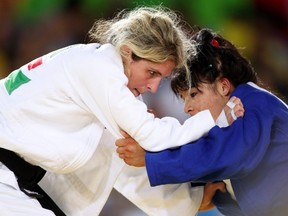 Canada's Priscilla Gagne, left, of Sarnia, Ont., battles Uzbekistan's Sevinch Salaeva during women's judo at Rio Olympic Arena at the Rio Paralympics in Rio de Janeiro, Brazil,  on Thursday, Sept. 8, 2016. Leah Hennel/Postmedia