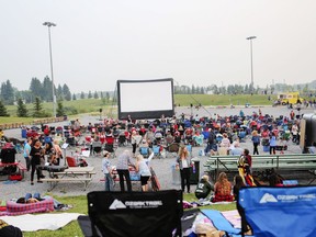 Crowds watch the 2018 Stony Plain outdoor movie. This year's event was close to being cancelled due to COVID-19, but organizers converted it to one where attendees must be in their cars.