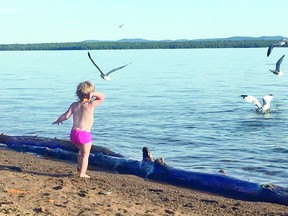 A youngster enjoys Batchawana Bay. Postmedia Network