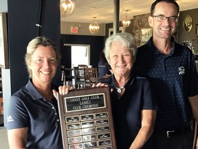 Photo courtesy Sally Herriman
Mary Hart (left) is presented with the 2019 championship plaque by defending champion Joyce Kenagy and Jeff Hamilton, the Sault Golf Club's head pro.  Hart captured her fourth women's club crown last August.