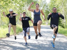 In this file photo, Bruce Gage, left, John McDonald, of Miles Against Cancer, Elizabeth Taillefer and Todd Menard, of the Northern Cancer Foundation, are warming up in preparation for XTERRA: Conquer the Crater.