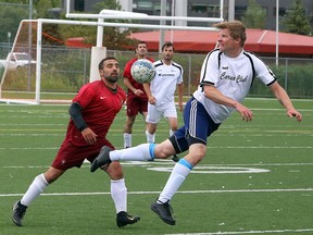 Dave Kalvieanen of SC Italia, right, heads a ball while watched closely by a Sault Stars player during Sudbury Star Cup action at James Jerome Sports Complex on Saturday, August 10, 2019. Ben Leeson/The Sudbury Star/Postmedia Network