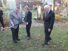 Arthur Milnes, joined by Msgr. Joseph Lynch of St. Joseph’s Catholic Church in Kingston in 2012, when former U.S. president Jimmy Carter and former first lady Rosalynn Carter planted ceremonial trees at Milnes’ Kingston home.