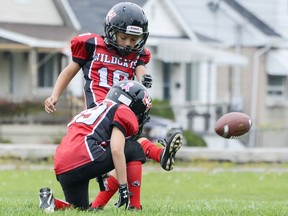 Jaxson Berniquer sets up Nolan Morrison's field goal attempt in the third quarter of the game. Morrison was two-for-nine in field goals for the game against the West Carleton Wolverines, on Sunday September 22, 2019 in Cornwall, Ont. Cornwall won 58-12. Phillip Blancher/Special to the Cornwall Standard-Freeholder/Postmedia Network