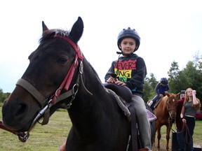 In this file photo, Lukas Poirier, 6, sits atop Sammy, a pony from Wagonwheel Ranch, during the Anderson Farm Fall Fair in Lively on Sept. 7, 2019. Anderson Farm is one of four local museums; the others are in Copper Cliff, the Flour Mill and Azilda. Council will discuss next week adding staff and creating an advisory panel to support the four museums.