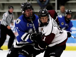 Chatham Maroons' Adrian Stubberfield (51) battles London Nationals' Jacob Chantler (9) in the third period at Chatham Memorial Arena in Chatham, Ont., on Sunday, Sept. 15, 2019. Mark Malone/Chatham Daily News/Postmedia Network