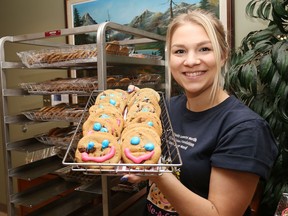 Jannik Hobson, communication and events support officer with the Health Sciences North Foundation (HSNF), displays cookies prepared for the annual Smile Cookie Campaign at the hospital in Sudbury, Ont. on Monday September 16, 2019.