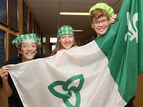 Julien Brunette, left, Isabelle Decaen and Xavier Viau dressed up for a Franco-Ontarian Day celebration at College Notre-Dame in Sudbury, Ont. on Wednesday September 25, 2019. Students and staff marked the day with a Franco-Ontarian quiz, karaoke, dancing and a presentation by local artist and Nickel Belt NDP candidate Stef Paquette.
