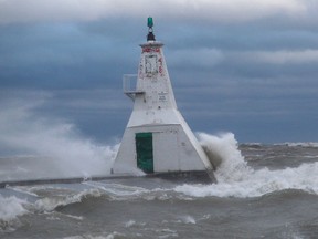 Powerful waves were crashing into the lighthouse at Erieau, Ontario on Sunday October 27, 2019 making it unsafe to be on the pier. (Ellwood Shreve/Chatham Daily News)