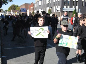Some of the over 200 participants in the annual Mental Illness Awareness Walk. Photo on Tuesday, October 8, 2019, in Cornwall, Ont. Todd Hambleton/Cornwall Standard-Freeholder/Postmedia Network