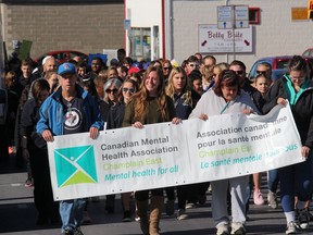 Some of the hundreds of participants in the annual Mental Illness Awareness Walk. Photo on Tuesday, October 8, 2019, in Cornwall, Ont. Todd Hambleton/Cornwall Standard-Freeholder/Postmedia Network