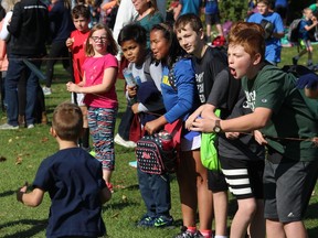 Some enthusiastic support for runners at the final stretch of the course, at the Iona Academy Cross-country Run in St. Raphaels. Photo on Thursday, October 10, 2019, in St. Raphaels, Ont. Todd Hambleton/Cornwall Standard-Freeholder/Postmedia Network