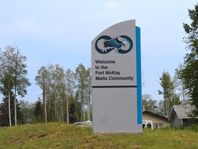 A sign welcoming people to the Fort McKay Metis community outside Fort McKay, Alta. on Saturday, June 23, 2018. Vincent McDermott/Fort McMurray Today/Postmedia Network