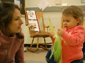 Amelia shows mum Brianne Ozimok how to shuck a cob of corn, at the EarlyOn Centre in Kincardine at the quarterly-annual Indigenous Culture Awareness Experience, which took place on the morning of Wednesday, October 23. During these playtimes, Becky Gibbons, from M'Wikwedong Indigenous Centre in Owen Sound comes to visit, and uses a variety of fun techniques such as music and story-telling to teach children from an early age about respecting cultural differences. Since the corn was recently harvested, Gibbons' focused on teaching the children about corn. Hannah MacLeod/Kincardine News