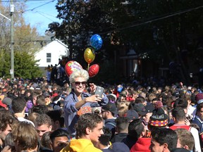 Thousands of students pack Aberdeen Street in Kingston's University District on Oct. 19, 2019, during the last in-person Queen's Homecoming weekend.