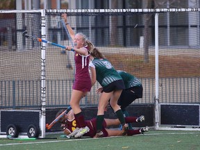 Rachel Oleschuk of the Regiopolis-Notre Dame Panthers celebrates teammate Makayla Cabral's championship-winning goal against the Holy Cross Crusaders in the Kingston Area Secondary Schools Athletic Association field hockey championship on Oct. 24, 2019. Field hockey will resume in 2021, but no spectators will be allowed at either outdoor or indoor games. Elliot Ferguson/The Kingston Whig-Standard/Postmedia Network