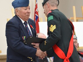 Master Cpl. Ted Johnston is presented with a certificate by Sgt. Will Tyres during the 19th annual Honouring Our Local Veterans event at the Royal Canadian Legion Branch 6 on Sunday, October 27, 2019 in Owen Sound, Ont. The event is put on by the Billy Bishop Home, Museum, Archives and National Historic Site. Rob Gowan/The Owen Sound Sun Times/Postmedia Network