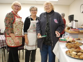 Auxiliary members Jeanne Lindsay and Pat Emmerton made helpful cookie recommendations for Sharron Colter, who stopped by the Hospital Auxilliary tea room and craft show during a roadtrip from her home in Lions Head. Hannah MacLeod/Kincardine News. Photo from 2019