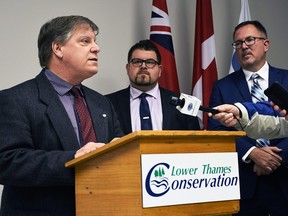 Mark Peacock, chief administrative officer and secretery-treasurer for the Lower Thames Valley Conservation Authority, left, speaks about a $1 million donation from the Ridge Landfill Community Trust for trees, wetlands and grassland habitats at the LTVCA offices in Chatham Nov.  21, 2019. He is joined by Chatham-Kent South Kent Coun. Anthony Ceccacci, centre, and Mayor Darrin Canniff. (Tom Morrison/Postmedia Network)