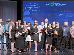 The winners of the annual Airdrie Business Awards pose together on stage at Bert Church Theatre on Thursday, Oct. 24, 2019. - Submitted by Portraits by Aly