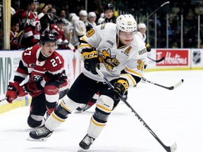 Sarnia Sting's Jamieson Rees (39) skates away from Jack Matier (27) of the Ottawa 67's in the first period at Progressive Auto Sales Arena in Sarnia, Ont., on Sunday, Nov. 17, 2019. Mark Malone/Chatham Daily News/Postmedia Network