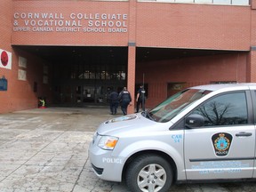A trio of police officers walk into CCVS while it was under lockdown, while cruisers and other police vehicles surrounded the building  on  Friday November 22, 2019 in Cornwall, Ont.

 Alan S. Hale/Cornwall Standard-Freeholder/Postmedia Network