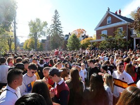 Thousands of students pack Aberdeen St. in Kingston's University District on Saturday, Oct. 19, 2019, during Queen's Homecoming weekend. Meghan Balogh/The Whig-Standard/Postmedia Network