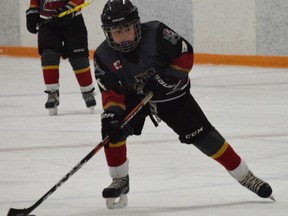 Evan MacCuspey of last season's South Huron Atom Rep Team lines up a shot in the 31st annual Bill Batten Memorial Tournament.