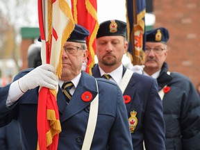 Exeter's annual Remembrance Day service will look different this year. The public is being discouraged from attending and instead, the Exeter Legion will be livestreaming the service. From the left are Bart Devries, Shannon Snow and Bob Snow, who served as part of the colour guard during the 2019 ceremony. Dan Rolph