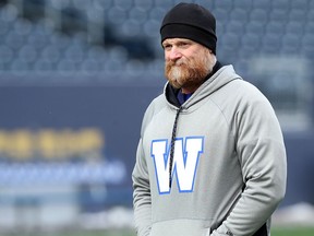 Head coach Mike O'Shea chills during Winnipeg Blue Bombers practice in Winnipeg on Nov. 13. The City of North Bay is dedicating a football field in his honour next weekend. Kevin King/Postmedia Network
