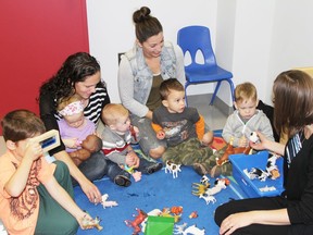 Moms and their children dropped in at the new Peace ParentLink location, close to Riverdrive Mall in Peace River, Alta., on Thursday, Sept. 3. In the playroom with Lenore Black, family community support worker (far right) are: Caelen Hogan, Sophie Hogan, mom Andrea Hogan and baby, Finley Hogan; Ashley Cossey with sons Keaton Cossey and Seth Cossey. JOANNE McQUARRIE/RECORD-GAZETTE/POSTMEDIA NETWORK