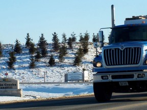 In this file photo, a truck passes by Waste Management's Twin Creeks Landfill near Watford.