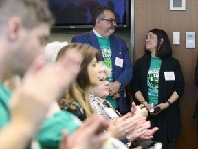 Toby and Bernadine Boulet look at one another as they are recognized during an event for Green Shirt Day and National Organ and Tissue Donation Awareness Week in Ottawa on April 3, 2019. The father of a young hockey player who donated his organs after dying in a catastrophic bus crash says a new bill before the Alberta legislature addressing the issue is a good start but has a long way to go. "(It's) a great start," said Toby Boulet. "In Alberta we need to do better." Six people benefitted from organs harvested from the body of Boulet's son Logan, a member of the SJHL's Humboldt Broncos who was among 16 killed when the team's bus collided with a truck in 2018. SEAN KILPATRICK / THE CANADIAN PRESS