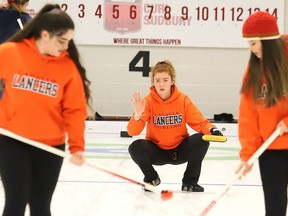 Lasalle Lancers skip Lauren Rajala, middle, calls out instructions to her teammates during girls high school curling action against College Notre-Dame at Curl Sudbury in Sudbury, Ont. on Tuesday November 19, 2019. John Lappa/Sudbury Star/Postmedia Network