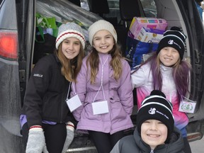 120 KDSS students were around Kincardine on Saturday, December 7 to pick-up donated non-perishable food items, hygeine products and toys to fill over 165 hampers just in time for Christmas. Hannah MacLeod/Kincardine News