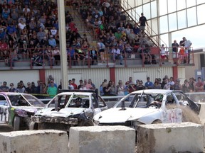 Four cars collide during the demolition derby in Woodstock, Ont. on Sunday August 25, 2019. The 183rd Woodstock Fair drew thousands of people for its annual four-day event. (Greg Colgan/Woodstock Sentinel-Review)