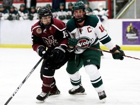 Chatham Maroons' Cam Symons (16) battles St. Marys Lincolns' Cayse Ton (10) in front of the Lincolns' net in the third period at Chatham Memorial Arena in Chatham, Ont., on Sunday, Dec. 15, 2019. Mark Malone/Chatham Daily News/Postmedia Network