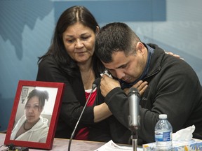 Tootsie Tuccaro and her son Paul comfort each other before taking media questions. Deputy Commissioner Curtis Zablocki, Commanding Officer of RCMP "K" Division, issued a public apology on behalf of the RCMP to the family of Amber Tuccaro on July 25, 2019. Tuccaro was murdered in 2010 in Leduc county. Photo by Shaughn Butts / Postmedia