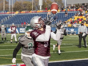 Receiver Nicholas Adair catches a touchdown pass to give the Frontenac Falcons a 12-10 lead over the Holy Cross Crusaders in the Kingston Area Secondary Schools Athletic Association senior football final on Nov. 9, 2019, at Richardson Stadium. The Crusaders went on to win the game, 19-15, for their third consecutive KASSAA title.