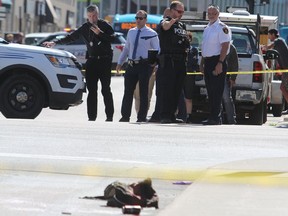 Kingston Police officers recap what occurred during a violent stabbing and subsequent police-involved shooting in downtown Kingston on Sept. 12, 2019. (Steph Crosier/The Whig-Standard)