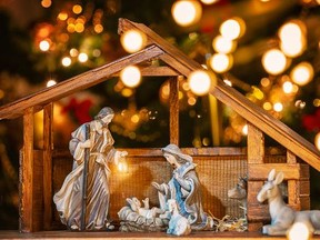 Christmas manger scene, including Jesus, Mary, Joseph and sheep.